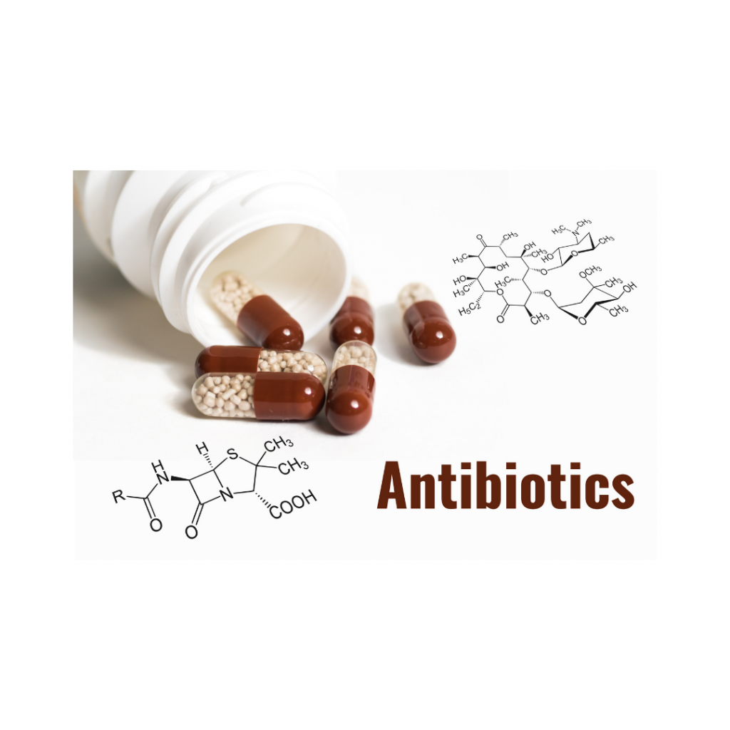 open bottle of important antibiotic pills spilled out